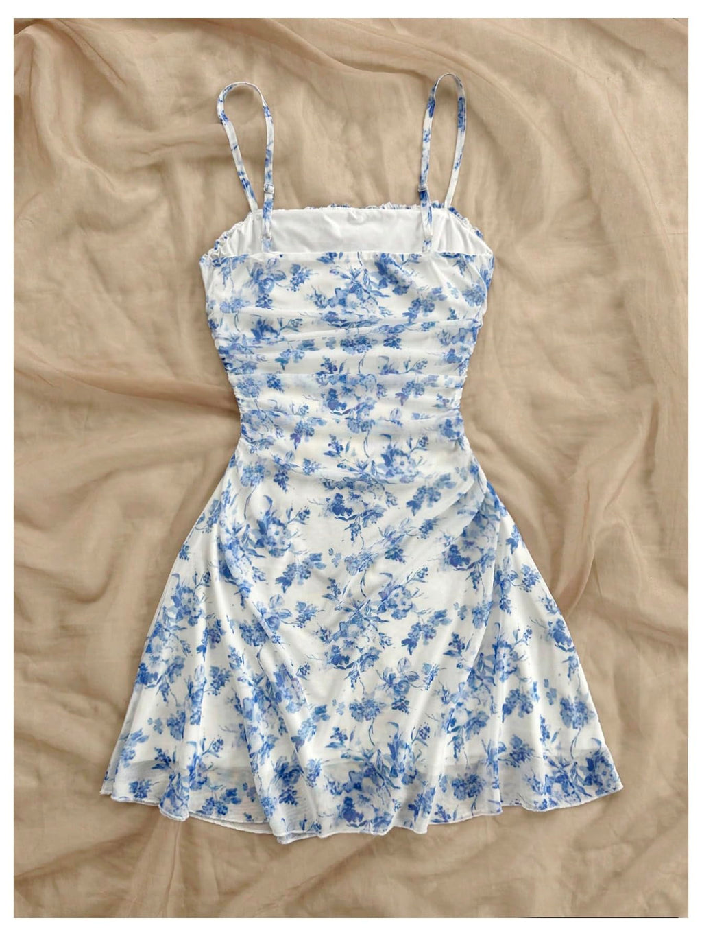 WDIRARA Women's Floral Print Ruched Cami Dress Spaghetti Strap Ruffle Hem Mesh Mini Dress Blue and White X-Small