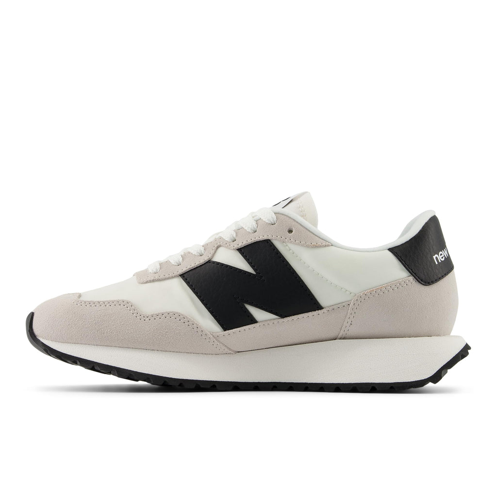 New Balance Women's 237 Sneaker, Sea Salt/Silver Birch/Black, 8 M