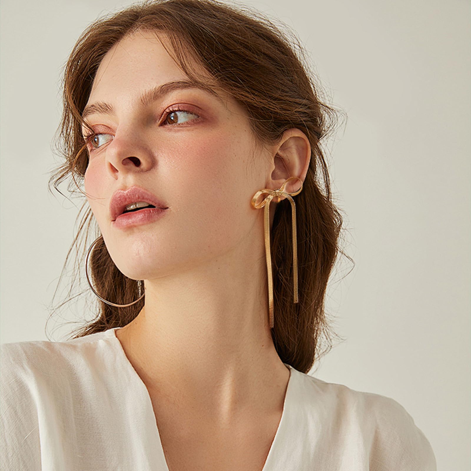 NVWAROCK Cilp-on Gold Bow Earrings Non Pierced Ribbon Bow Dangle Drop Tassel Statement Earring for Women 14K Real Gold Plated Dangling Long chain Earrings