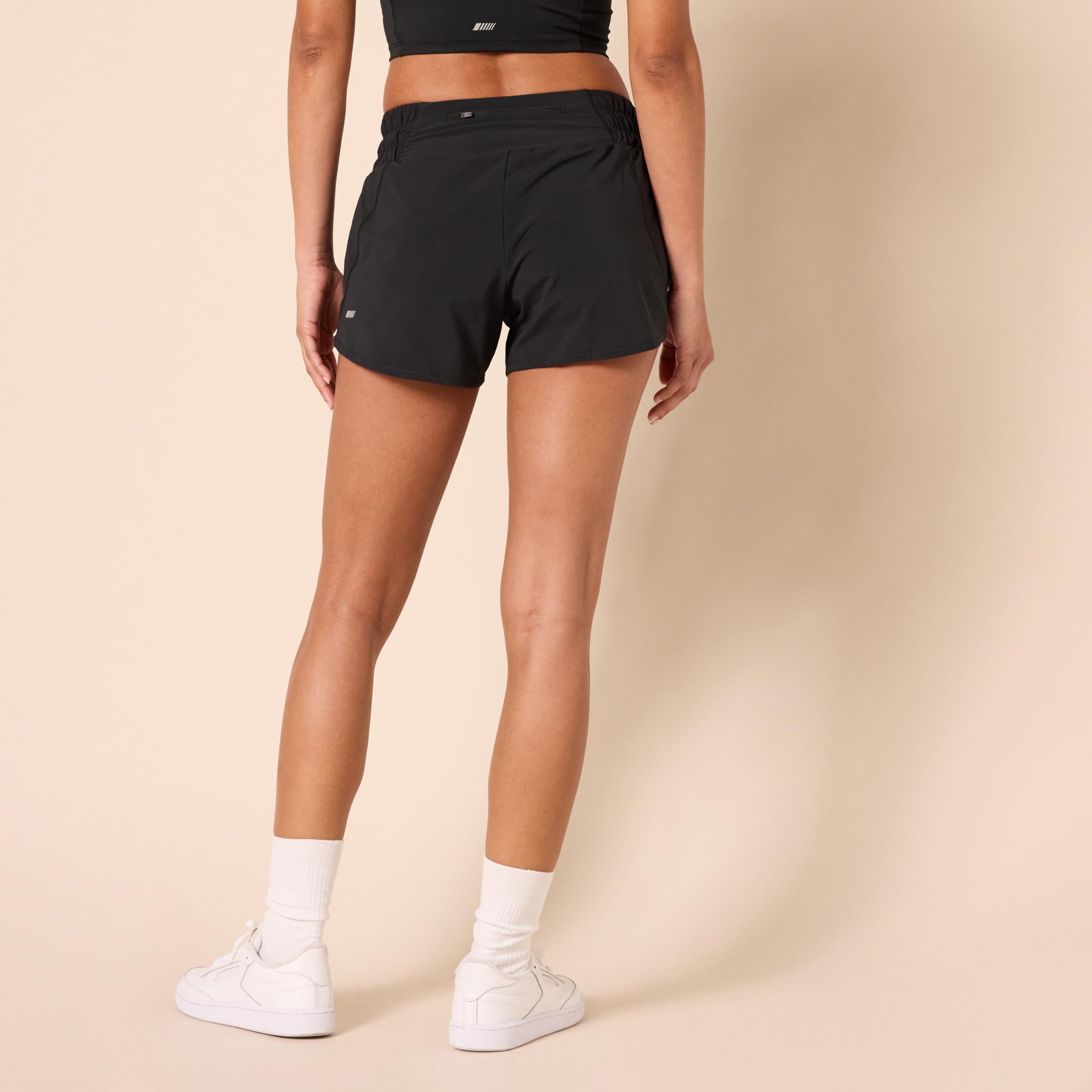 Amazon Essentials Women's Regular-Fit Athletic Ruched Waistband Woven Running Shorts with Zip Pocket, Black, Large