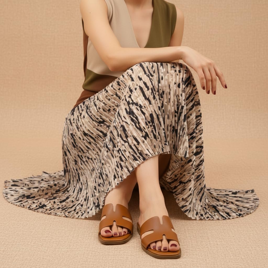 CUSHIONAIRE Voyage Cutout Strap Slides for Women, Slip On Summer Flats, Trendy Footwear, Memory Foam Vegan Leather Comfortable Vacation Style Sandals 2026, WHISKEY 9.5