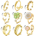 LOWNOUR Fidget Ring Anxiety Rings for Women Gold 9pcs Adjustable Spinner Ring CZ Diamond Sunflower Moon Star Four Leaf Heart Bead Fidget Rings for Anxiety Stress Relief for Women