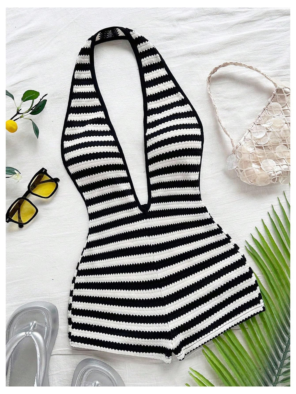 WDIRARA Women's Striped Textured Backless Halter Jumpsuits Deep V Neck Sleeveless One Piece Romper Black and White Small